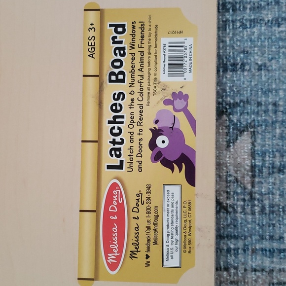 Melissa and Doug Wooden Latches Locks Activity Play Board - Picture 6 of 9